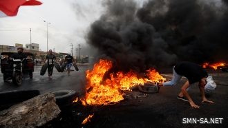 محتجون يسدون مدخل ميناء أم قصر العراقي